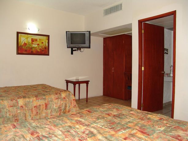 Imagen de la habitación del Hotel Posada Arcos. Foto 16