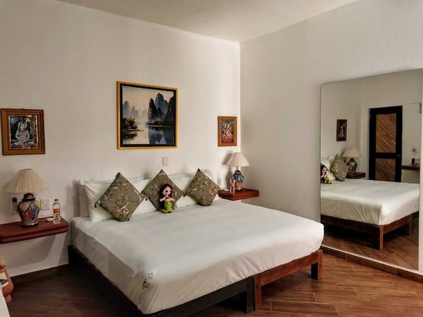 Imagen de la habitación del Hotel Posada Buda Tortuga. Foto 14