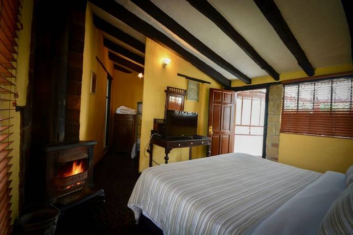 Imagen de la habitación del Hotel Posada Caf&eacute; La Huerta. Foto 12