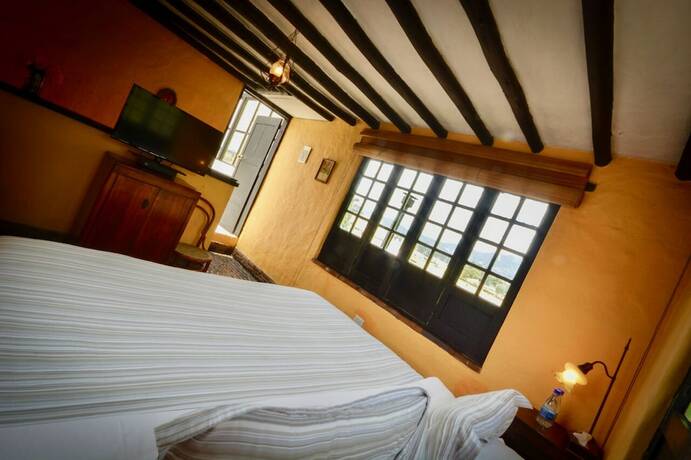 Imagen de la habitación del Hotel Posada Caf&eacute; La Huerta. Foto 17