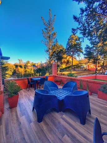 Imagen de la habitación del Hotel Posada Chalet Suisse. Foto 10