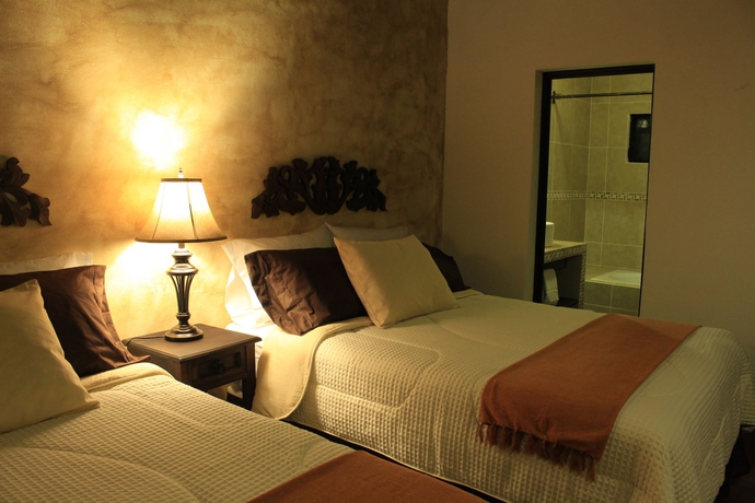 Imagen de la habitación del Hotel Posada De La Luna. Foto 4