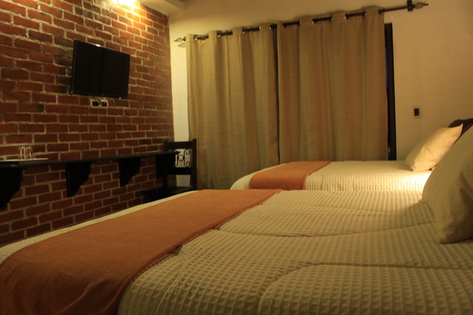 Imagen de la habitación del Hotel Posada De La Luna. Foto 5