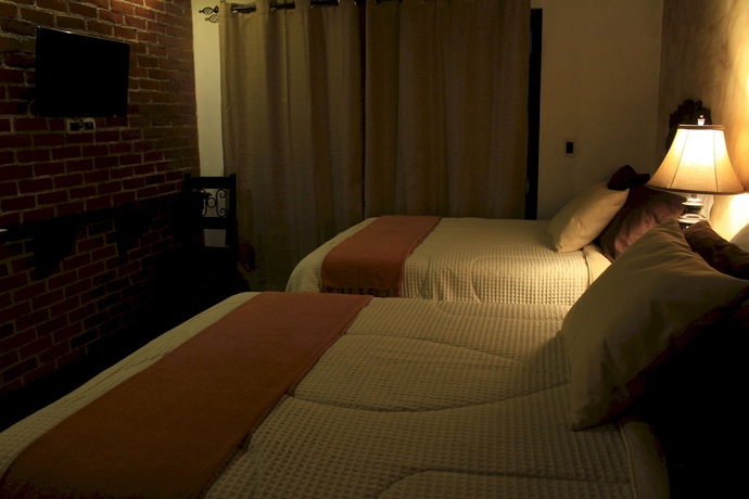 Imagen de la habitación del Hotel Posada De La Luna. Foto 10