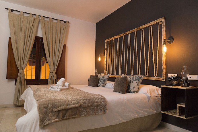 Imagen de la habitación del Hotel Posada De Las Cuevas. Foto 13