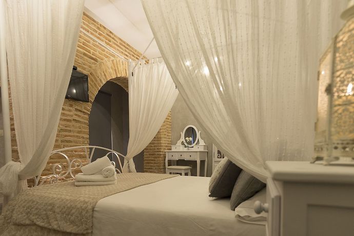 Imagen de la habitación del Hotel Posada De Las Cuevas. Foto 15