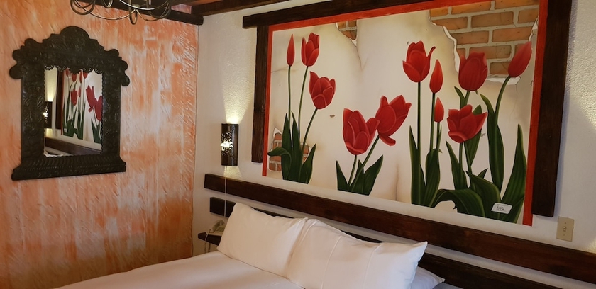 Imagen de la habitación del Hotel Posada De Las Flores Loreto. Foto 3