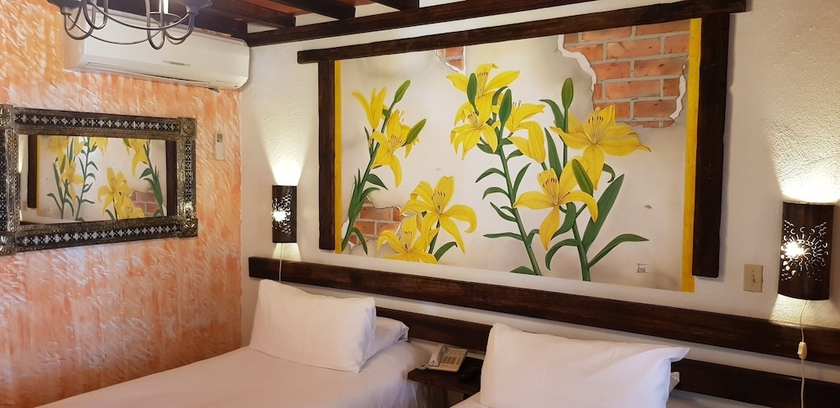 Imagen de la habitación del Hotel Posada De Las Flores Loreto. Foto 6