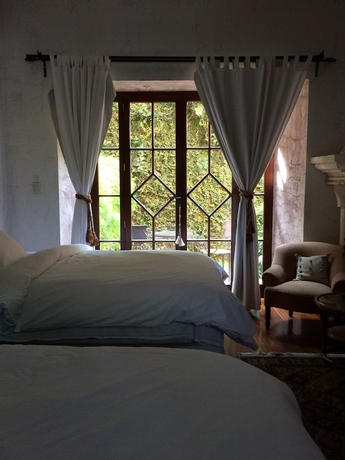 Imagen de la habitación del Hotel Posada De Los Leones. Foto 14