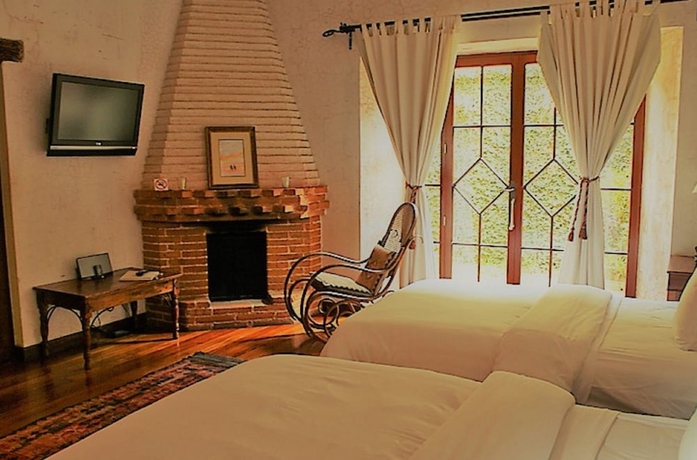 Imagen de la habitación del Hotel Posada De Los Leones. Foto 15