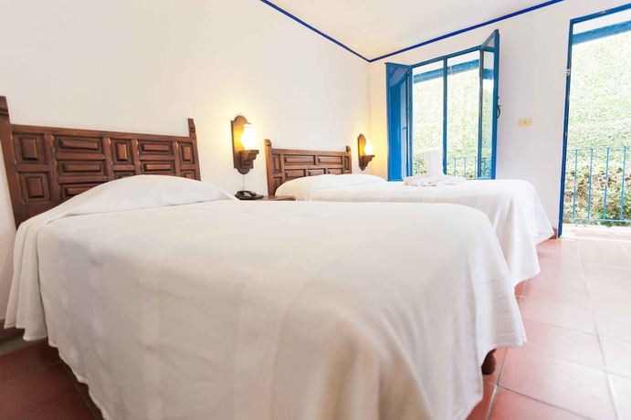 Imagen de la habitación del Hotel Posada Del Cafeto. Foto 4