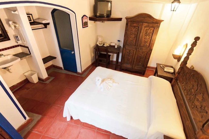 Imagen de la habitación del Hotel Posada Del Cafeto. Foto 7