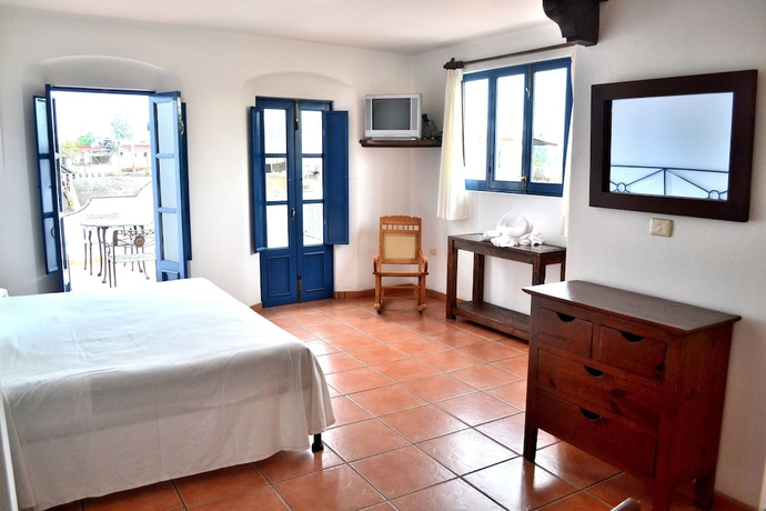 Imagen de la habitación del Hotel Posada Del Cafeto. Foto 13