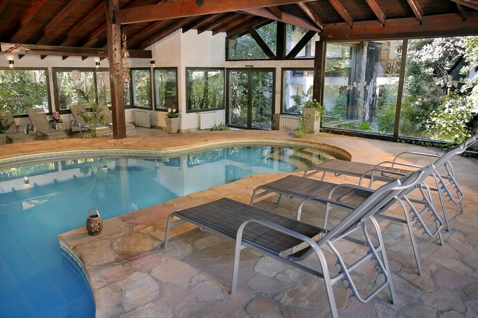 Imagen de la piscina del Hotel Posada Del Sauce. Foto 30