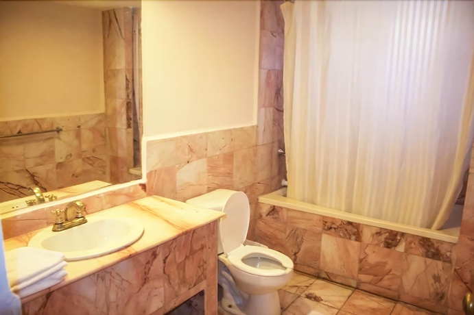 Imagen de la habitación del Hotel Posada Del Sol Inn. Foto 10