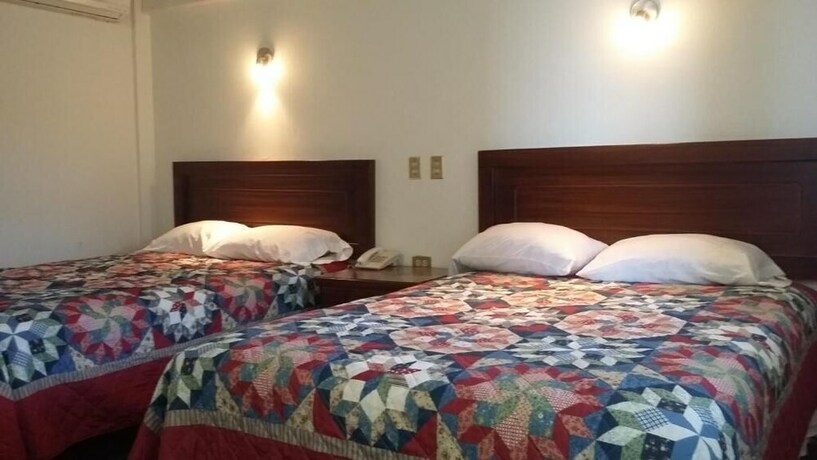 Imagen de la habitación del Hotel Posada Del Yaqui. Foto 11