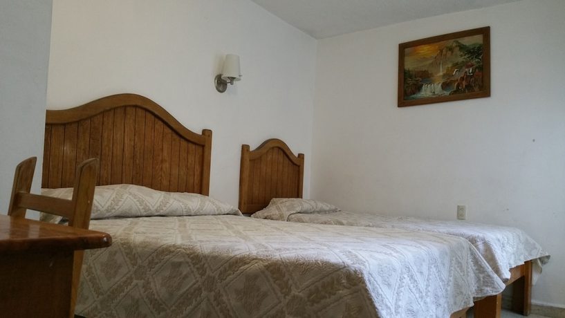 Imagen de la habitación del Hotel Posada Diamante. Foto 6