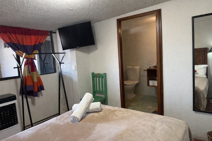 Imagen de la habitación del Hotel Posada Don Mario. Foto 4