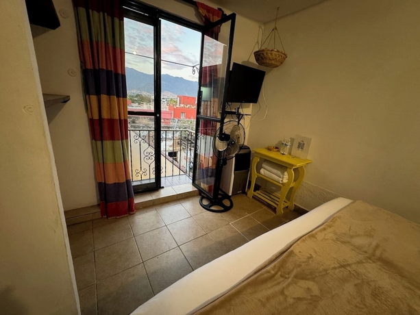 Imagen de la habitación del Hotel Posada Don Mario. Foto 8