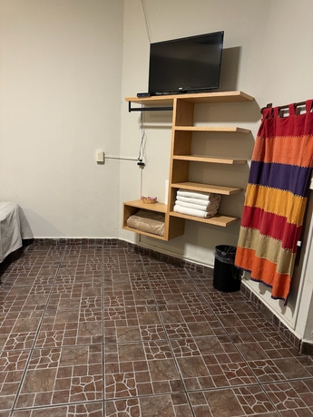 Imagen de la habitación del Hotel Posada Don Mario. Foto 10