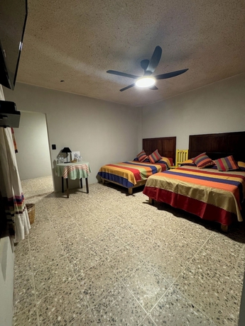 Imagen de la habitación del Hotel Posada Don Mario. Foto 12