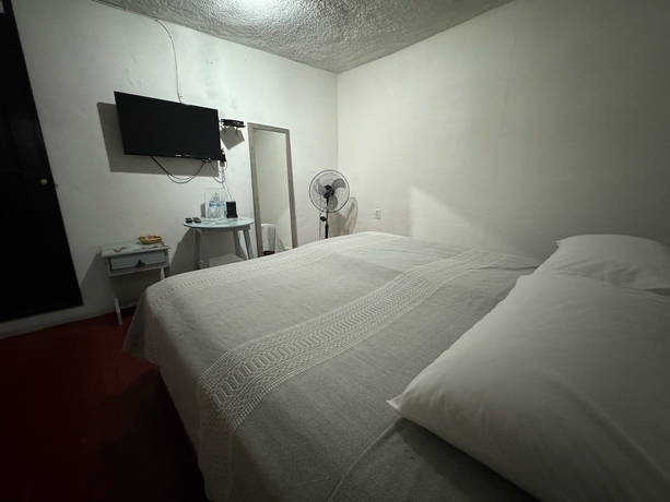 Imagen de la habitación del Hotel Posada Don Mario. Foto 16