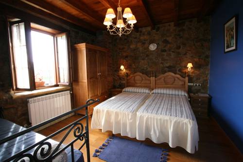 Imagen de la habitación del Hotel Posada El Angel De La Guarda. Foto 11