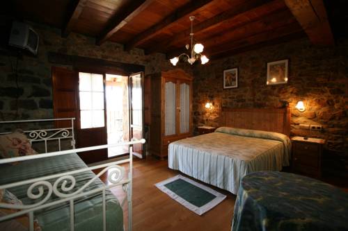 Imagen de la habitación del Hotel Posada El Angel De La Guarda. Foto 15