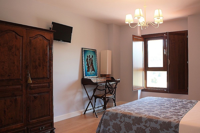 Imagen de la habitación del Hotel Posada El Campo. Foto 9