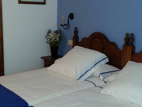 Imagen de la habitación del Hotel Posada El Hoyal. Foto 7