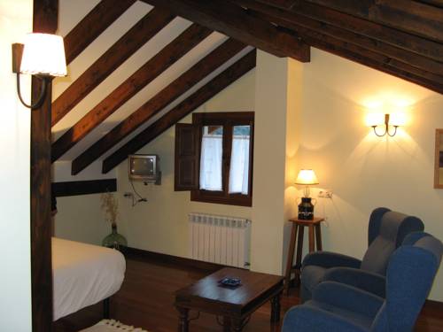 Imagen de la habitación del Hotel Posada El Hoyal. Foto 14