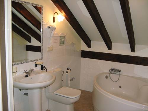 Imagen de la habitación del Hotel Posada El Hoyal. Foto 15