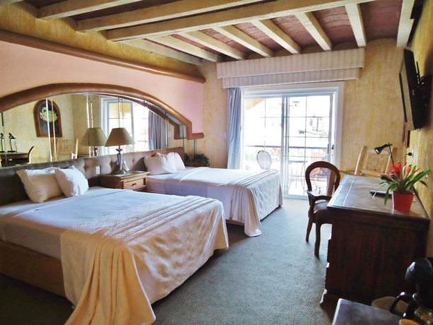 Imagen de la habitación del Hotel Posada El Rey Sol. Foto 4