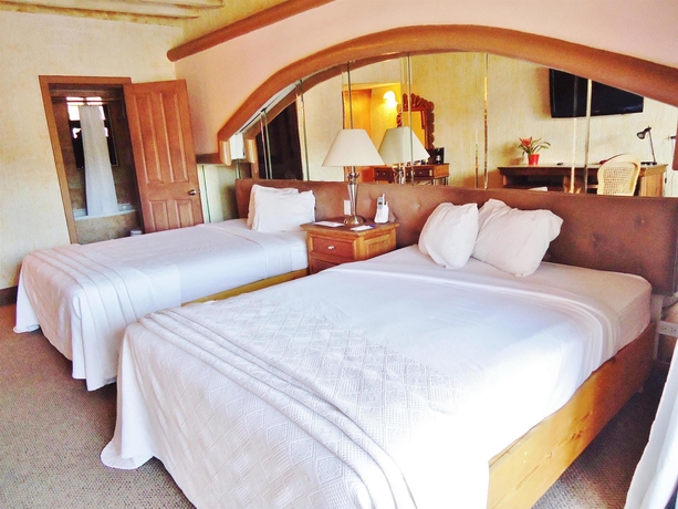 Imagen de la habitación del Hotel Posada El Rey Sol. Foto 6