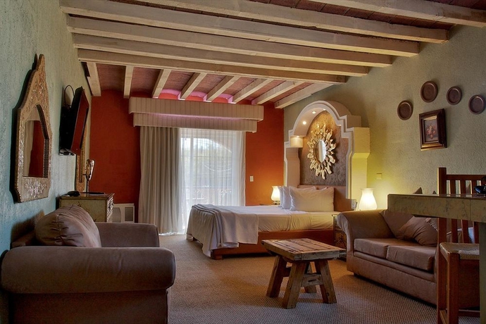 Imagen de la habitación del Hotel Posada El Rey Sol. Foto 7