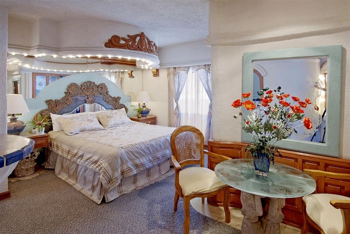 Imagen de la habitación del Hotel Posada El Rey Sol. Foto 8