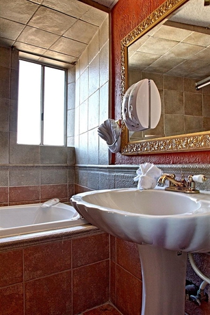 Imagen de la habitación del Hotel Posada El Rey Sol. Foto 9