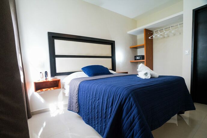 Imagen de la habitación del Hotel Posada Flamingos. Foto 18