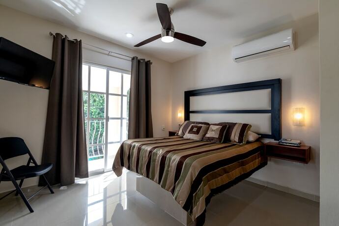 Imagen de la habitación del Hotel Posada Flamingos. Foto 19