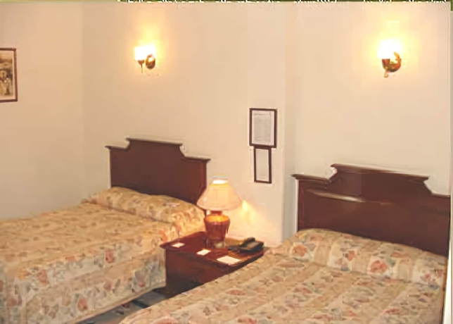 Imagen de la habitación del Hotel Posada Hidalgo Inn. Foto 4