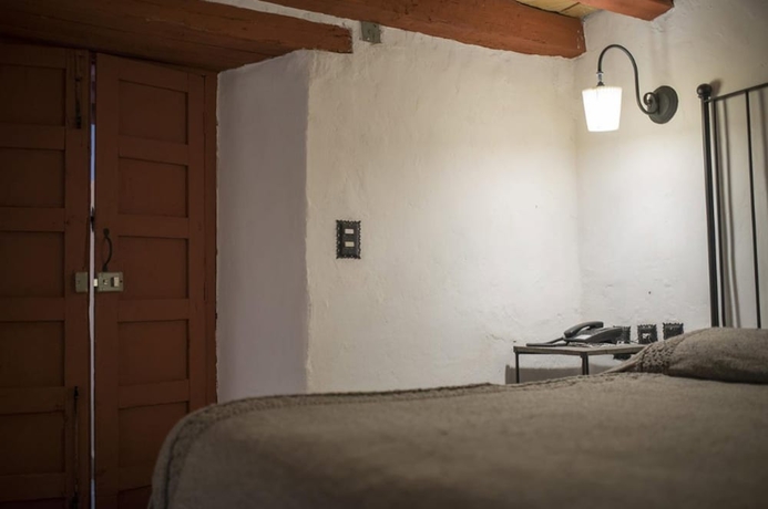 Imagen de la habitación del Hotel Posada La Basilica. Foto 10