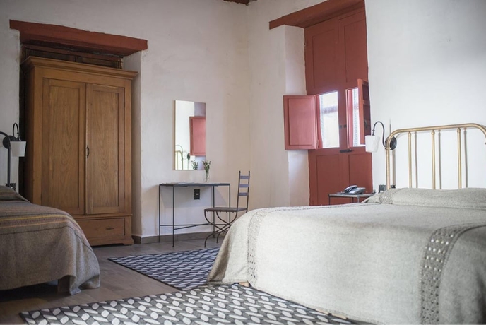 Imagen de la habitación del Hotel Posada La Basilica. Foto 15
