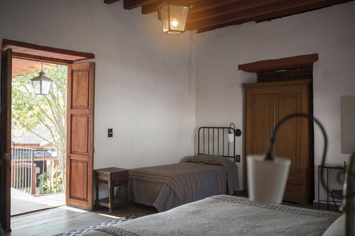 Imagen de la habitación del Hotel Posada La Basilica. Foto 16