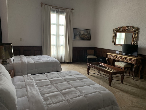 Imagen de la habitación del Hotel Posada La Ermita. Foto 5