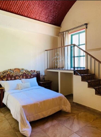 Imagen de la habitación del Hotel Posada La Ermita. Foto 6