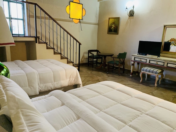 Imagen de la habitación del Hotel Posada La Ermita. Foto 9