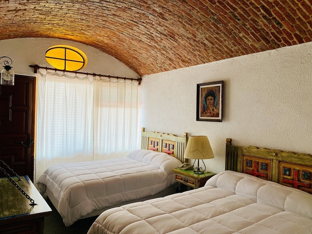 Imagen de la habitación del Hotel Posada La Ermita. Foto 12