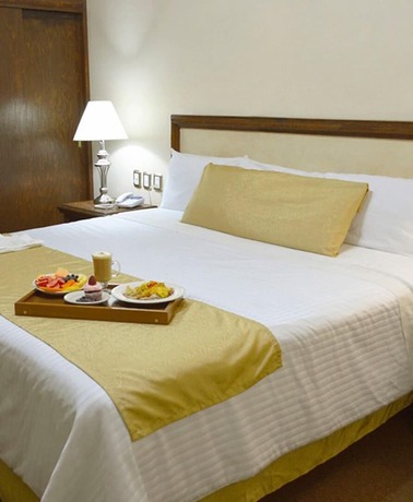 Imagen de la habitación del Hotel Posada La Fuente. Foto 14