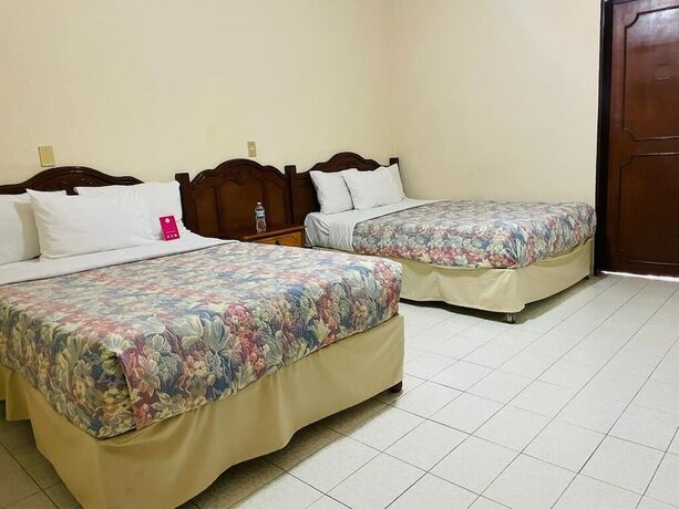 Imagen de la habitación del Hotel Posada La Fuente. Foto 18