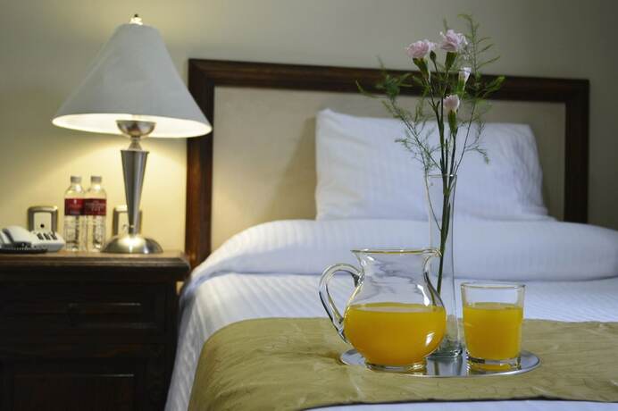 Imagen de la habitación del Hotel Posada La Fuente. Foto 19